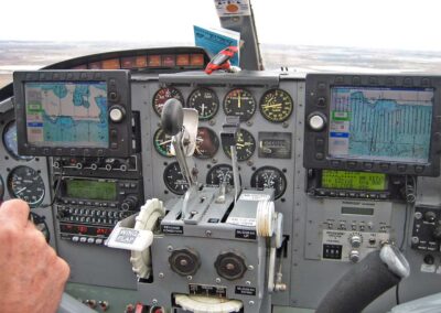 Photo showing dashboard of N754 including the AeroPC computer monitors. Photo by Debbie Groves, USFWS