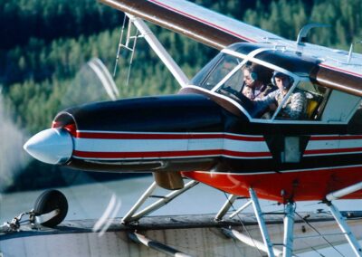 N754 flying near Berner's Bay Alaska, 1984. Bruce Conant is pilot, Steve Cain in right seat. Photo by Karen Bollinger, USFWS