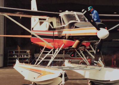 N754 outside hangar with Bruce Conant cleaning windscreen; in Victoria BC, Canada, early 2000s. Photo: Viking Air